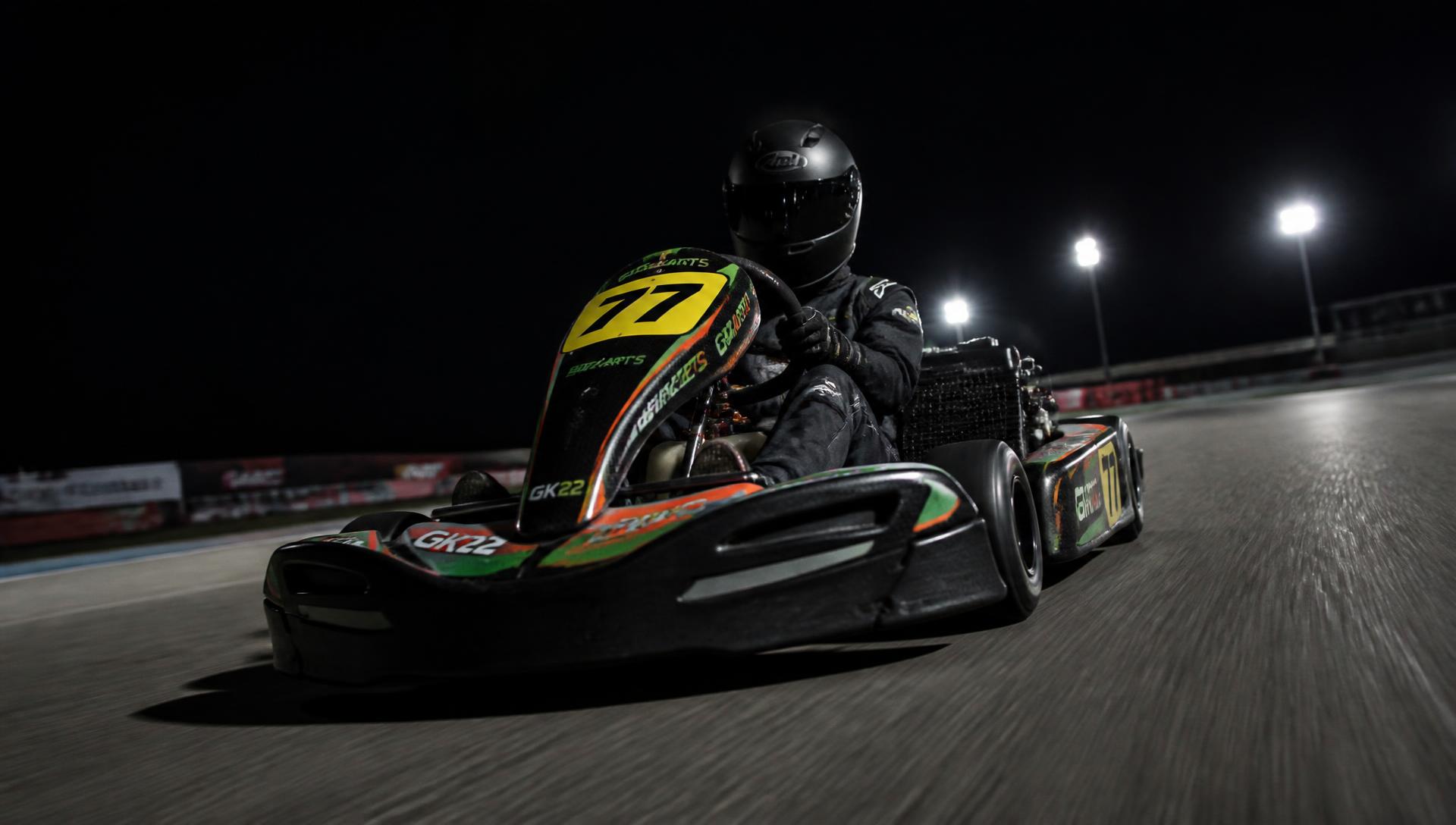 Trafficlight Racing kart at speed under floodlights